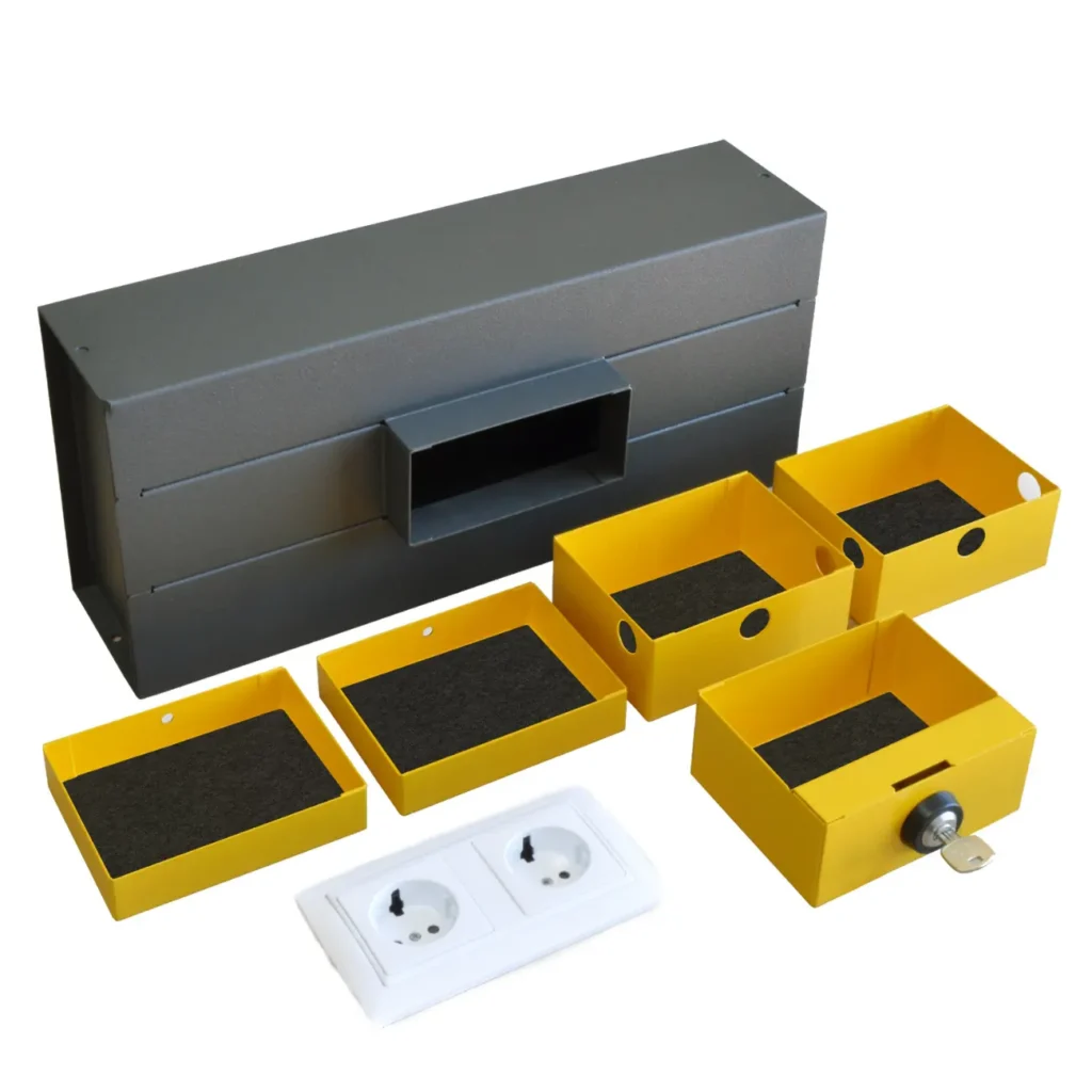 Caja fuerte con forma de enchufe para camuflar en pared