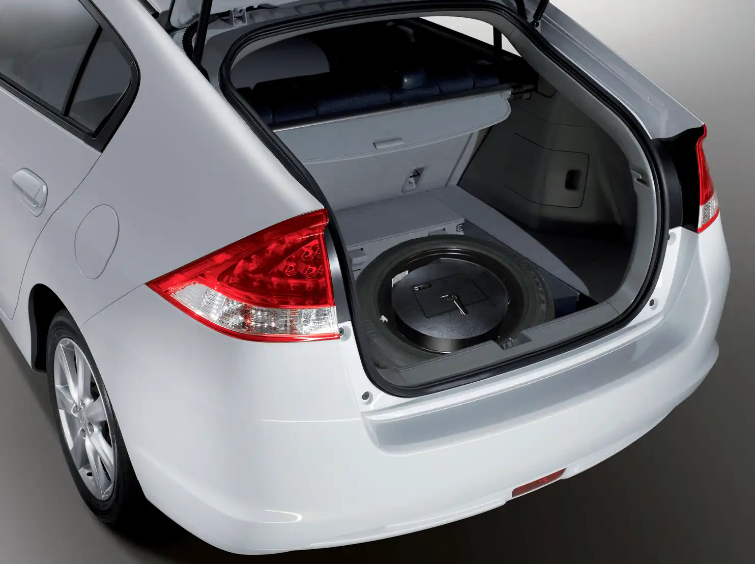 Caja fuerte cilíndrica para ocultar en un maletero de un choche